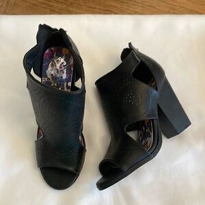 CHRISTIAN LACROIX BLACK CUTOUT SHOOTIES.  NEW IN BOX